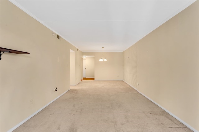 5841 Morrowfield Ave Unit 104, Squirrel Hill, PA 15217 - spare room featuring light colored carpet, crown molding, baseboards, and an inviting chandelier