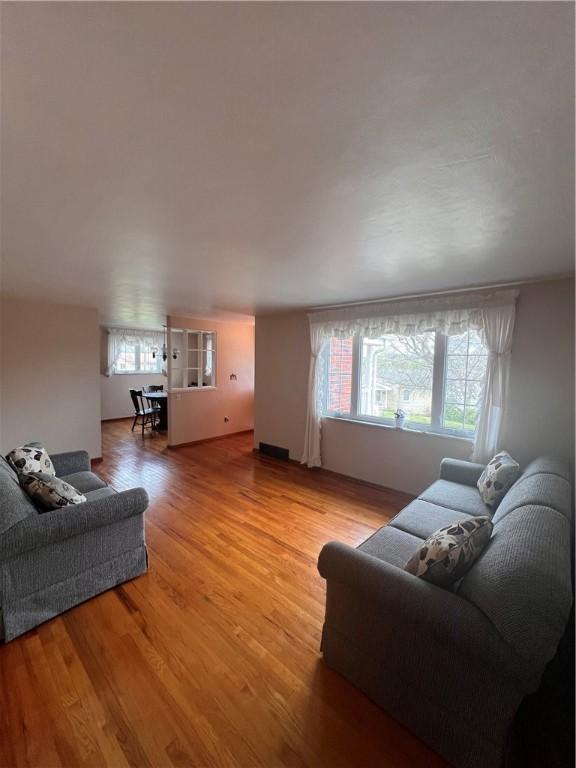 living area featuring light wood finished floors