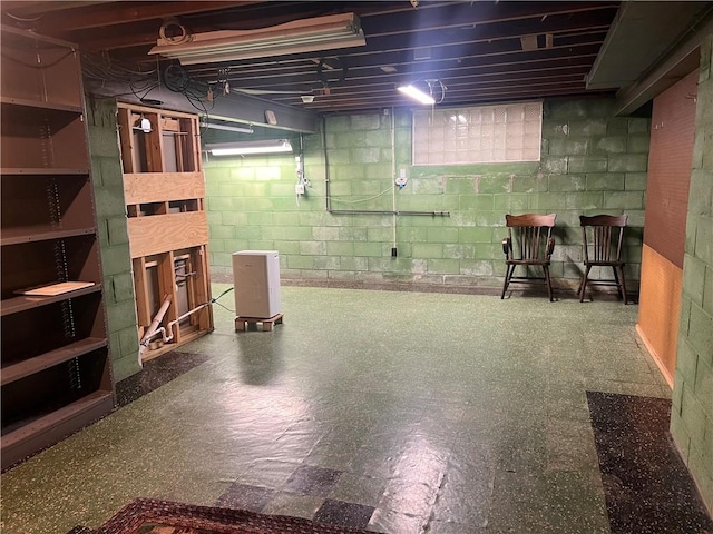 unfinished basement featuring tile patterned floors