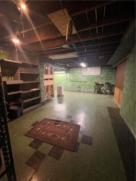 unfinished basement featuring tile patterned floors
