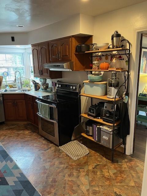 111 Mckenney Dr, Brighton Twp, PA 15009 - kitchen with visible vents, under cabinet range hood, range with two ovens, a sink, and dishwasher