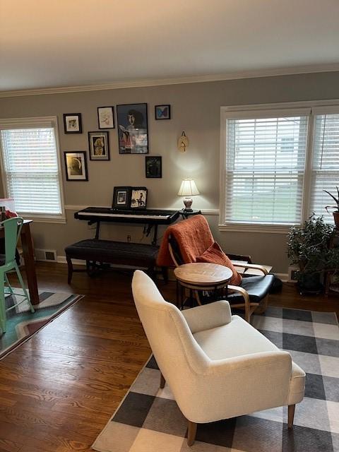 111 Mckenney Dr, Brighton Twp, PA 15009 - sitting room with crown molding, a wealth of natural light, and wood finished floors