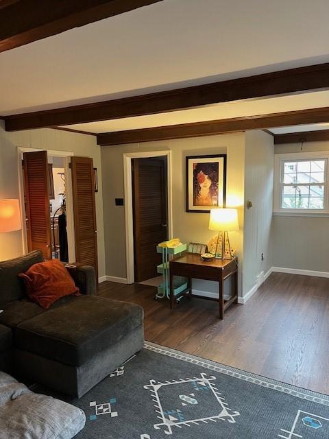 111 Mckenney Dr, Brighton Twp, PA 15009 - living area with baseboards, beam ceiling, and wood finished floors