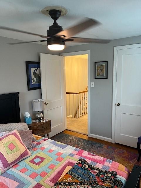 111 Mckenney Dr, Brighton Twp, PA 15009 - bedroom with baseboards, a ceiling fan, and wood finished floors