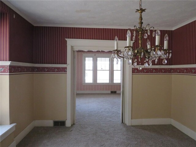 437 Shady Ave, Charleroi Boro, PA 15022 - unfurnished dining area with a chandelier, carpet floors, and ornamental molding