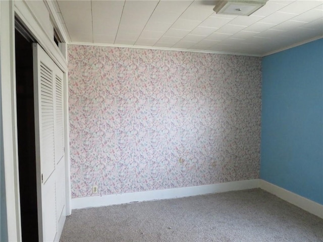 437 Shady Ave, Charleroi Boro, PA 15022 - carpeted empty room featuring ornamental molding, wallpapered walls, and baseboards