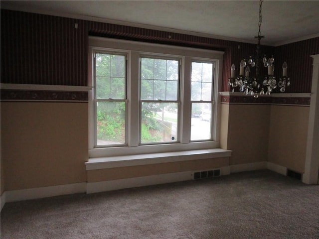 437 Shady Ave, Charleroi Boro, PA 15022 - unfurnished dining area with healthy amount of natural light, carpet, a chandelier, and ornamental molding