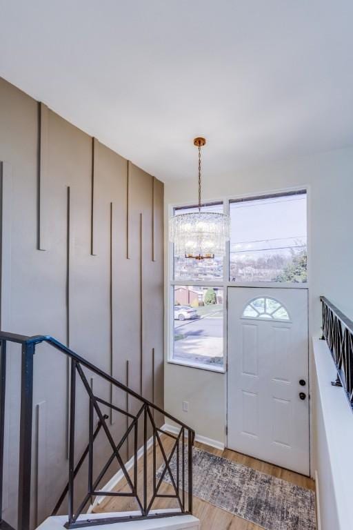 130 Castle, West Mifflin, PA 15122 - entrance foyer featuring wood finished floors and a chandelier