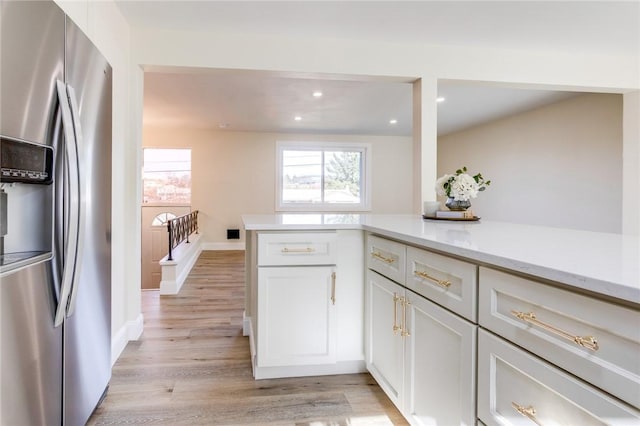 130 Castle, West Mifflin, PA 15122 - kitchen featuring recessed lighting, stainless steel fridge with ice dispenser, baseboards, light wood finished floors, and white cabinets