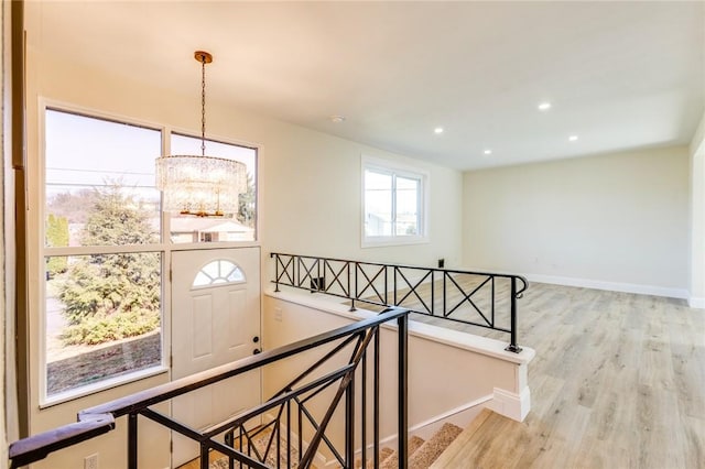 130 Castle, West Mifflin, PA 15122 - staircase featuring baseboards, wood finished floors, a chandelier, and recessed lighting