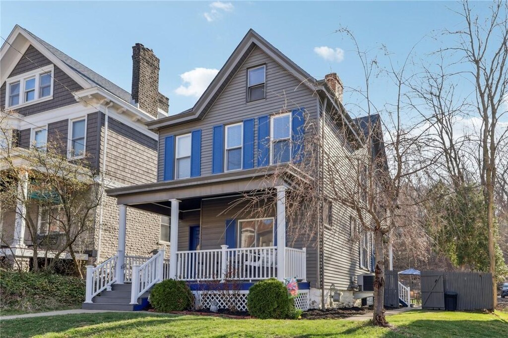 200 N Sprague Ave, Bellevue, PA 15202 - view of front of property with a chimney, a porch, and a front yard