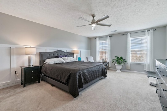 145 Brighton Ln, Adams Twp, PA 16046 - bedroom featuring light carpet, ceiling fan, a textured ceiling, and baseboards