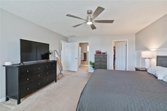 145 Brighton Ln, Adams Twp, PA 16046 - bedroom with light carpet, baseboards, ceiling fan, and connected bathroom