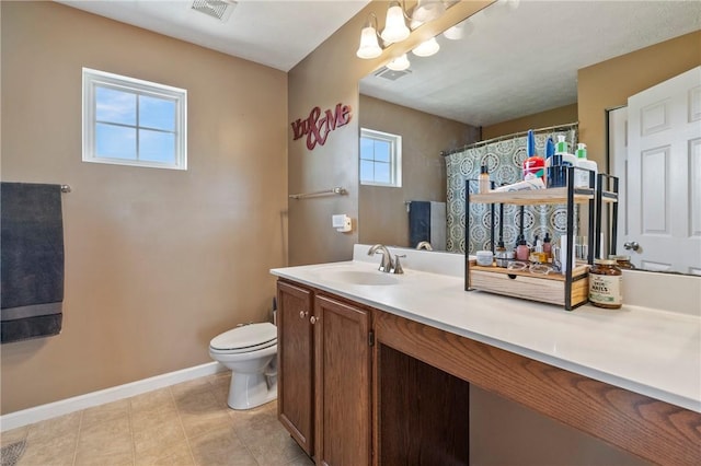 145 Brighton Ln, Adams Twp, PA 16046 - full bath featuring toilet, vanity, baseboards, tile patterned floors, and a shower with shower curtain