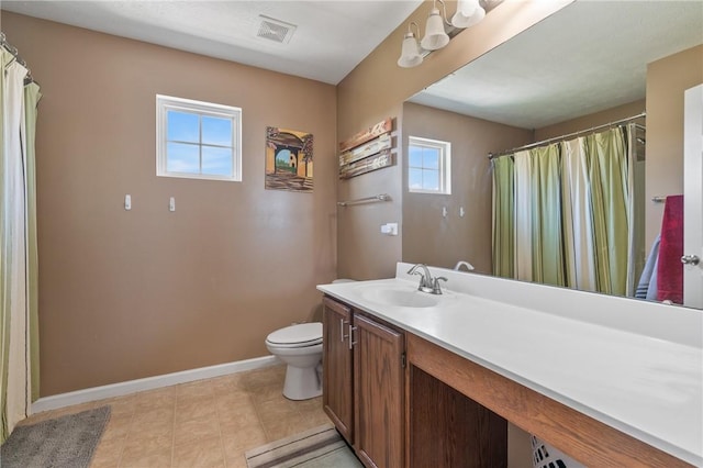 145 Brighton Ln, Adams Twp, PA 16046 - full bath with toilet, vanity, baseboards, tile patterned flooring, and curtained shower