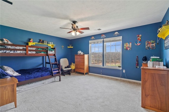 145 Brighton Ln, Adams Twp, PA 16046 - carpeted bedroom featuring a textured ceiling, baseboards, and ceiling fan