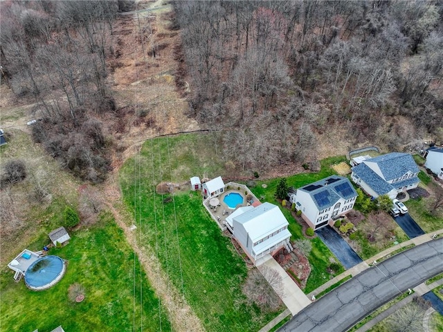 drone / aerial view of a pool area