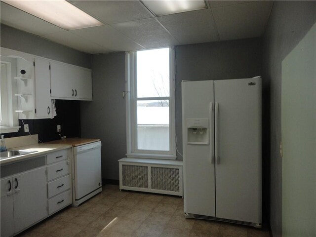 161 Ord St, Salisbury, PA 15558 - kitchen featuring white cabinetry, a paneled ceiling, radiator, and white appliances