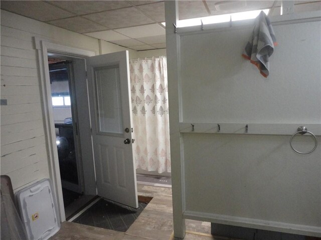 161 Ord St, Salisbury, PA 15558 - bathroom featuring wood walls, curtained shower, and a drop ceiling