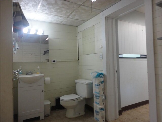 161 Ord St, Salisbury, PA 15558 - bathroom with toilet, wood walls, and vanity