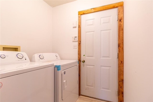 laundry room with washing machine and dryer and laundry area