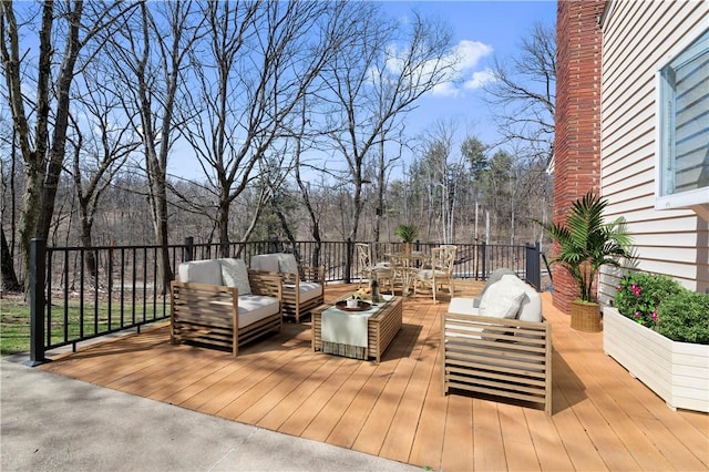 wooden deck with outdoor lounge area
