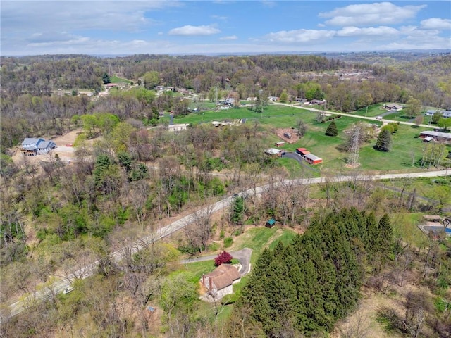 aerial view featuring a forest view
