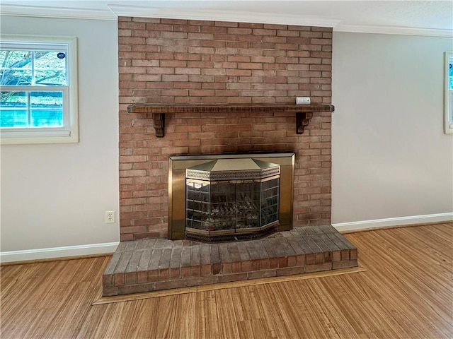 1248 Satellite Cir, Upper St Clair, PA 15241 - detailed view of a fireplace, wood finished floors, and crown molding