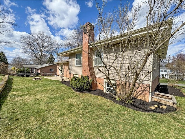 1248 Satellite Cir, Upper St Clair, PA 15241 - back of house with a yard and a chimney