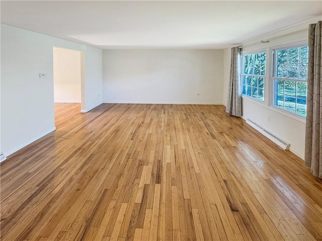 1248 Satellite Cir, Upper St Clair, PA 15241 - empty room featuring baseboard heating and light wood-style floors