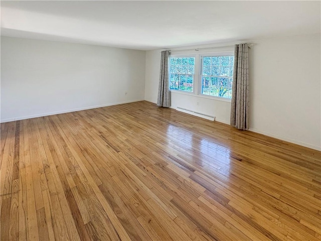 1248 Satellite Cir, Upper St Clair, PA 15241 - spare room with baseboard heating and light wood-type flooring