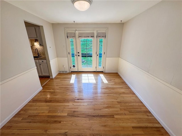 1248 Satellite Cir, Upper St Clair, PA 15241 - entryway with light wood finished floors and a sink