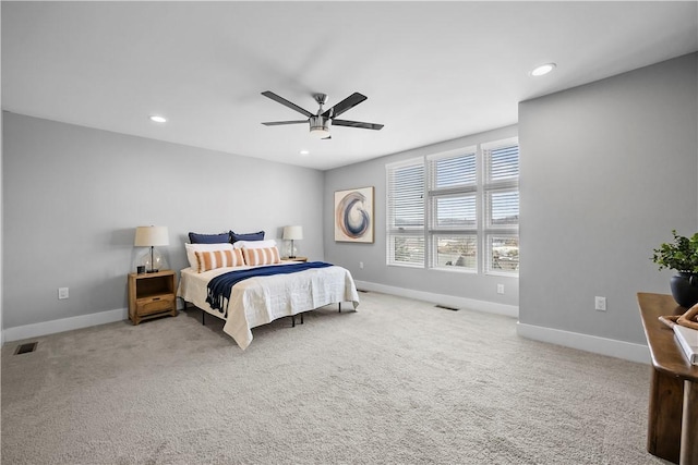 carpeted bedroom with recessed lighting, baseboards, and visible vents