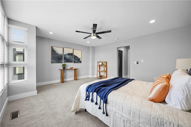 carpeted bedroom featuring baseboards, visible vents, ceiling fan, and recessed lighting