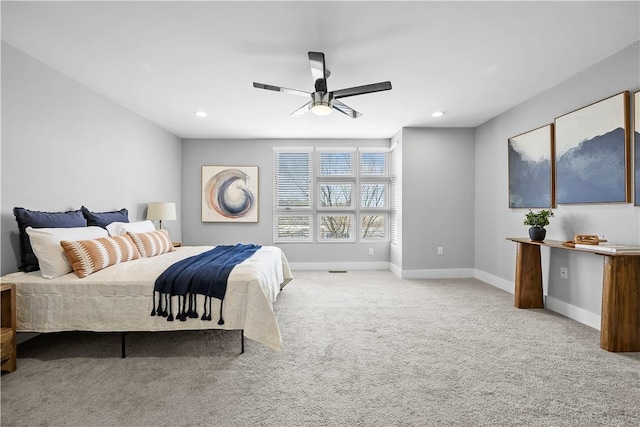 bedroom featuring a ceiling fan, carpet, baseboards, and recessed lighting