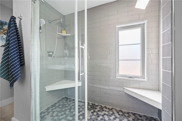 bathroom featuring a shower stall