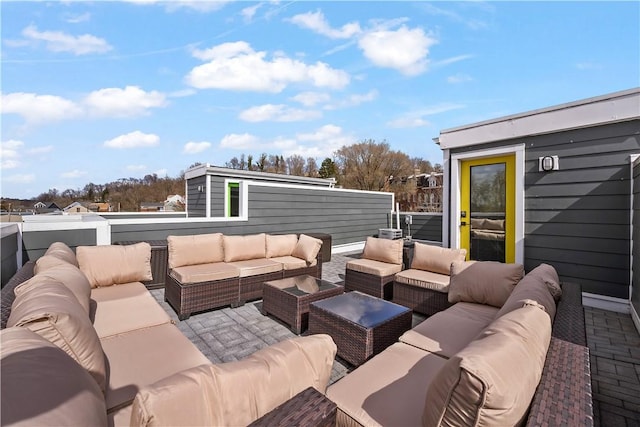 exterior space featuring an outdoor living space and a balcony