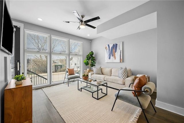 living room with dark wood-style flooring, recessed lighting, baseboards, and ceiling fan