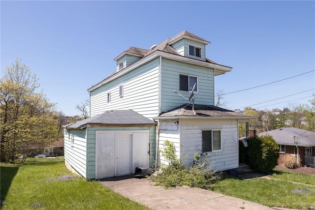 1113 Nash Ave, Monessen, PA 15062 - rear view of property featuring a yard, a storage unit, and an outbuilding