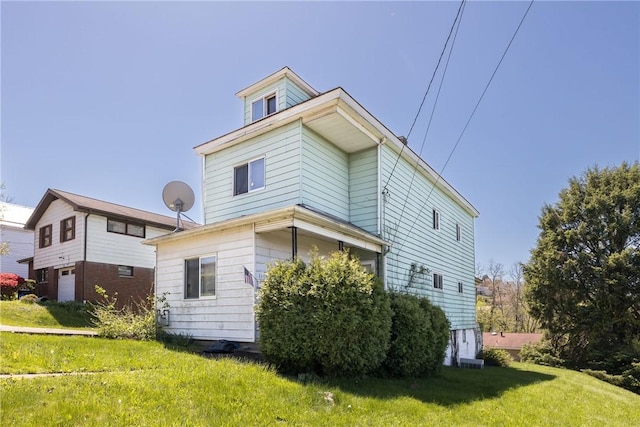 1113 Nash Ave, Monessen, PA 15062 - view of home's exterior with a lawn