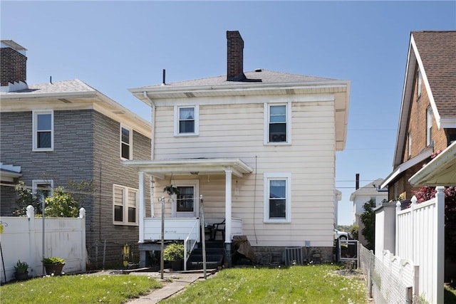 1008 Athalia Ave, Monessen, PA 15062 - rear view of property with a chimney