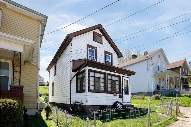view of front of home with fence