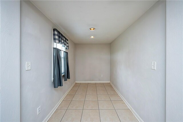 719 Zimmerman St, Jeannette, PA 15644 - corridor with light tile patterned floors and recessed lighting