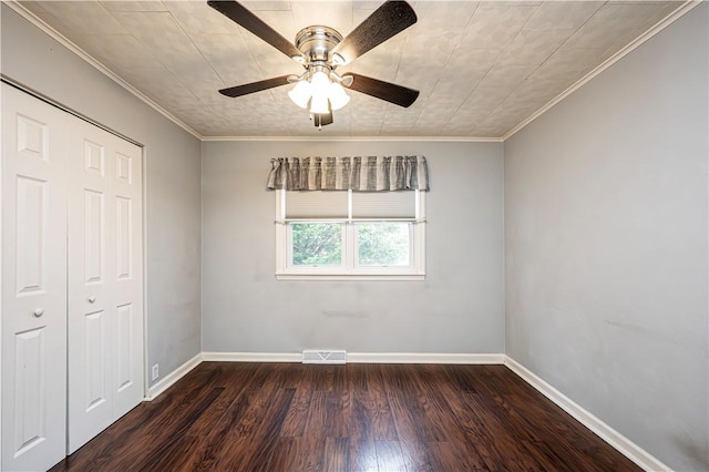 719 Zimmerman St, Jeannette, PA 15644 - unfurnished bedroom featuring wood finished floors, a closet, crown molding, and a ceiling fan