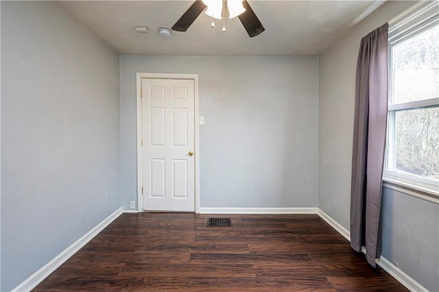 719 Zimmerman St, Jeannette, PA 15644 - spare room with healthy amount of natural light, a ceiling fan, a smoke detector, and wood finished floors