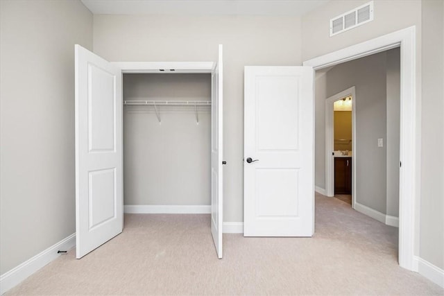 111 Quail Run Rd Unit 1, Peters Twp, PA 15367 - unfurnished bedroom featuring light carpet, a closet, and baseboards