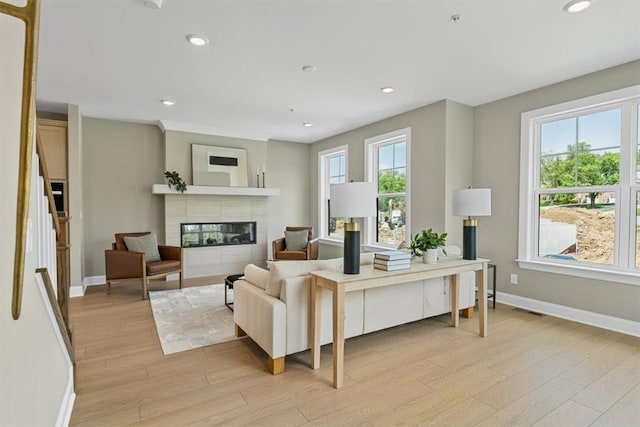 111 Quail Run Rd Unit 1, Peters Twp, PA 15367 - living area featuring light wood-style floors, baseboards, recessed lighting, and a tiled fireplace