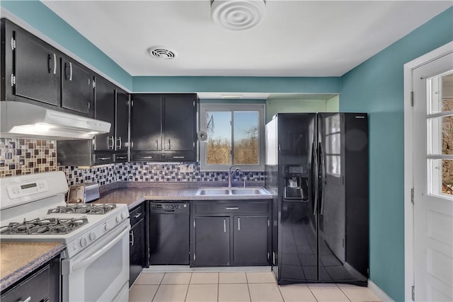 614 Tartan Dr, Monroeville, PA 15146 - kitchen with visible vents, tasteful backsplash, under cabinet range hood, a sink, and black appliances
