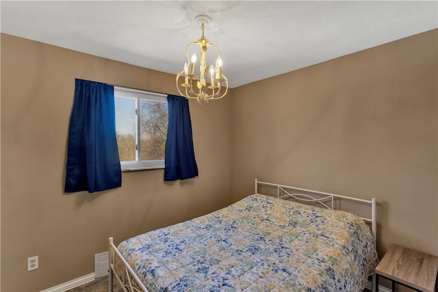 614 Tartan Dr, Monroeville, PA 15146 - bedroom featuring baseboards, a notable chandelier, and visible vents