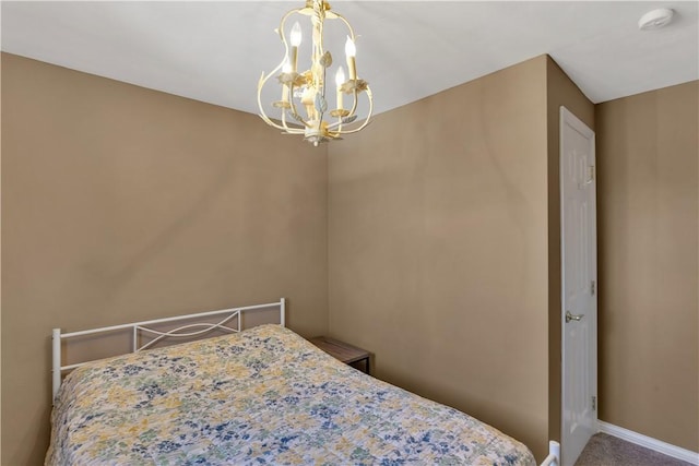 614 Tartan Dr, Monroeville, PA 15146 - bedroom with baseboards, a notable chandelier, and carpet